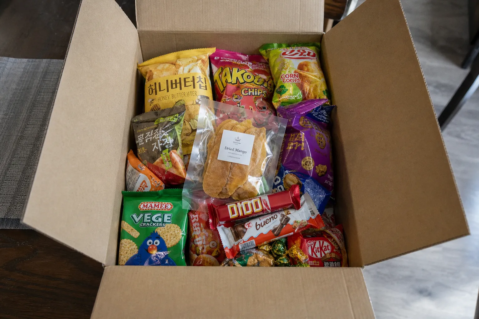 Global snack boxes compared on variety, cost, and taste